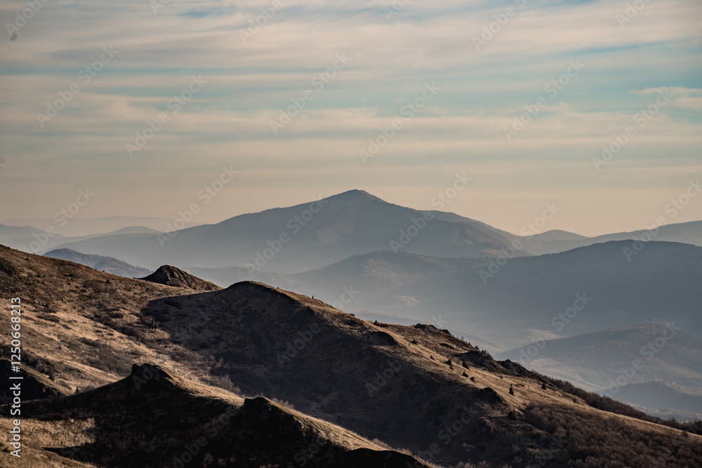 Scenic autumn landscapes from a trekking loop in Bieszczady, featuring views from Tarnica, Halicz, Rozsypaniec, Bukowe Berdo, Połonina Wetlińska, and the Ukrainian Bieszczady under a clear blue sky Scenic autumn landscapes from a trekking loop in Bieszczady, featuring views from Tarnica, Halicz, Rozsypaniec, Bukowe Berdo, Połonina Wetlińska, and the Ukrainian Bieszczady under a clear blue sky