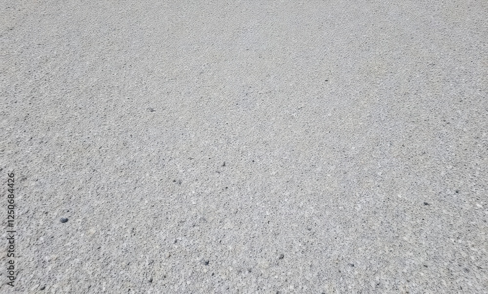 Close-up of a textured gray concrete surface Close-up of a textured gray concrete surface
