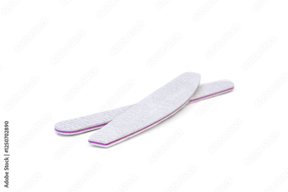 Fototapeta premium Gray nail file with different abrasive isolated on white background.