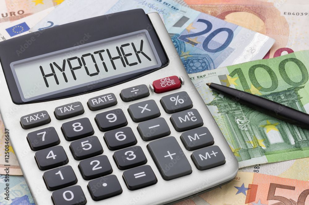 Taschenrechner mit Geldscheinen - Hypothek Taschenrechner mit Geldscheinen - Hypothek