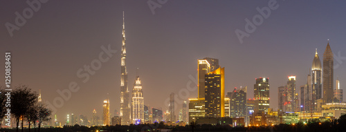 Photography DUBAI, UAE - MARCH 31, 2017: The evening skyline of Downtown with the Burj Khalifa and Emirates Towers