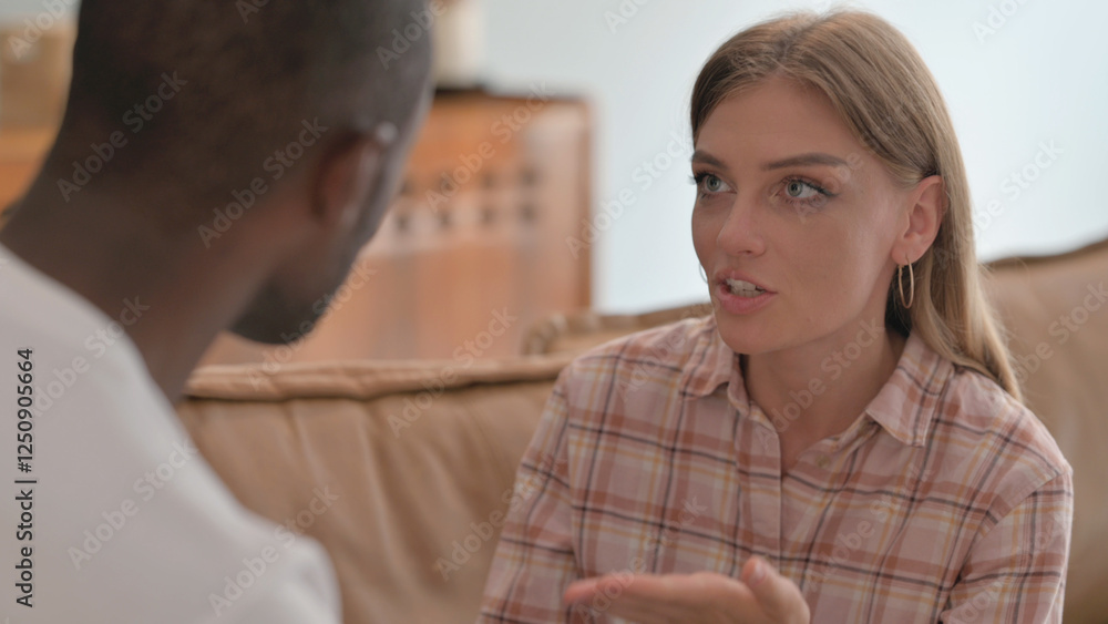 Woman Talking with African Man, Interracial Couple at Home Woman Talking with African Man, Interracial Couple at Home