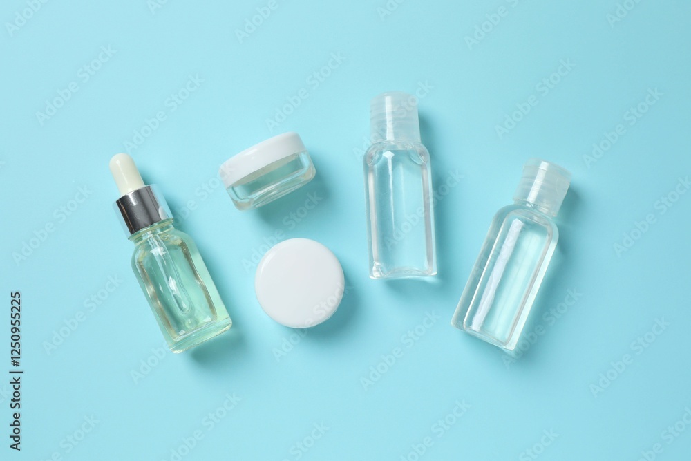 Naklejka premium Natural cosmetic products on a blue background, top view