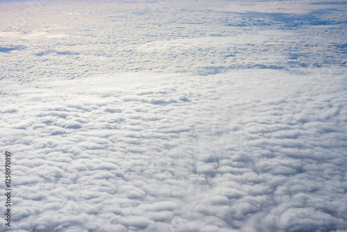 Obraz na płótnie View of clouds from airplane window, clouds in a blue sky w salonie
