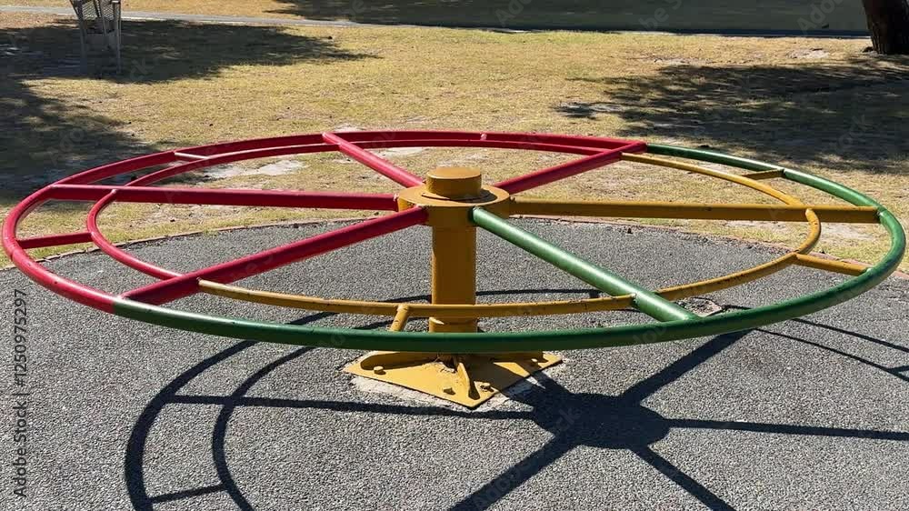 A spinning roundabout or merry go round in a park in Cape Town. A spinning roundabout or merry go round in a park in Cape Town.