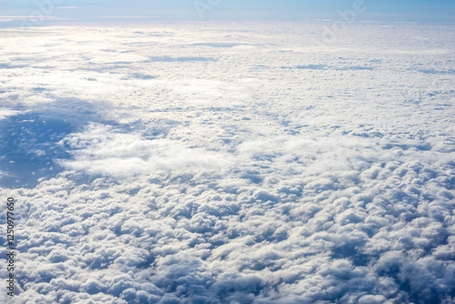 Obraz na płótnie View of clouds from airplane window, clouds in a blue sky w salonie