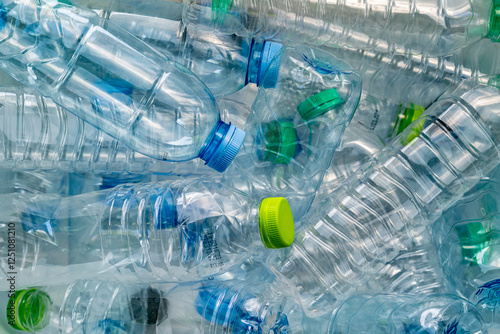 Bild auf Leinwand A pile of discarded plastic water bottles, highlighting the issue of plastic pollution