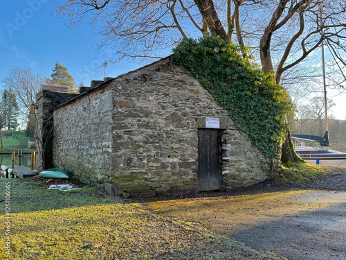 A rustic stone boathouse photo