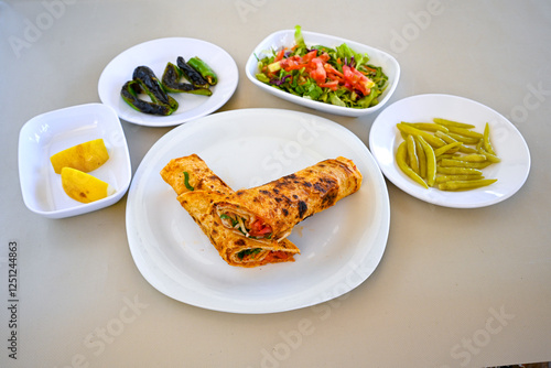 Kiymali pide.Turkish pide with minced meat. Turkish pizza mince pita Pide on white . Etli ekmek.Kusbasi kasarli, kiymali kasarli, kiymali yumurtali, Bafra, Trabzon, Kusbasili pide. Urfa acili lahmacun photo