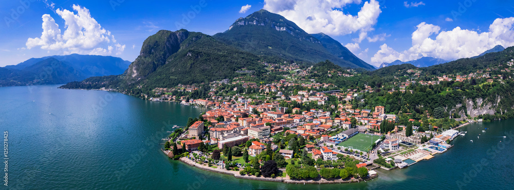 Fototapeta premium Idyllic lake scenery, amazing Lago di Como. Aerial view of beautiful Menaggio town. Italy, Lombardia. Aerial drone panoramic view