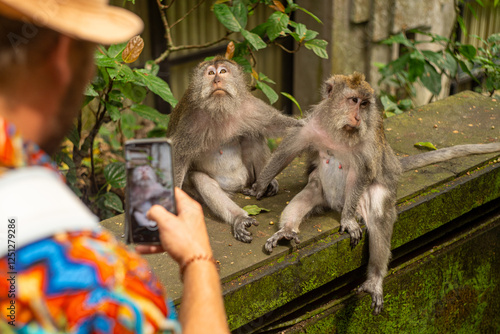 Canvas Print Two monkeys in the Monkey Forest posing for a selfie.