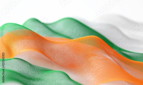 Waving Irish flag, close-up, white background, patriotism photo