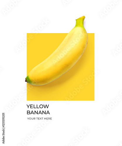 Creative layout made of yellow banana on the yellow and white background. Flat lay. Food concept. Lemon on white background.