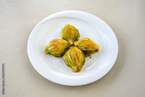 Turkish Dessert Sobiyet, havuc dilimi, midye baklava, mussels baklava and classic baklava with Pistachio . Cikoltali cevizli, fistikli soguk Baklava, top view. photo