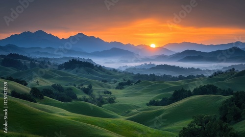 Sunset over lush green mountains scenic landscape tranquil nature majestic viewpoint