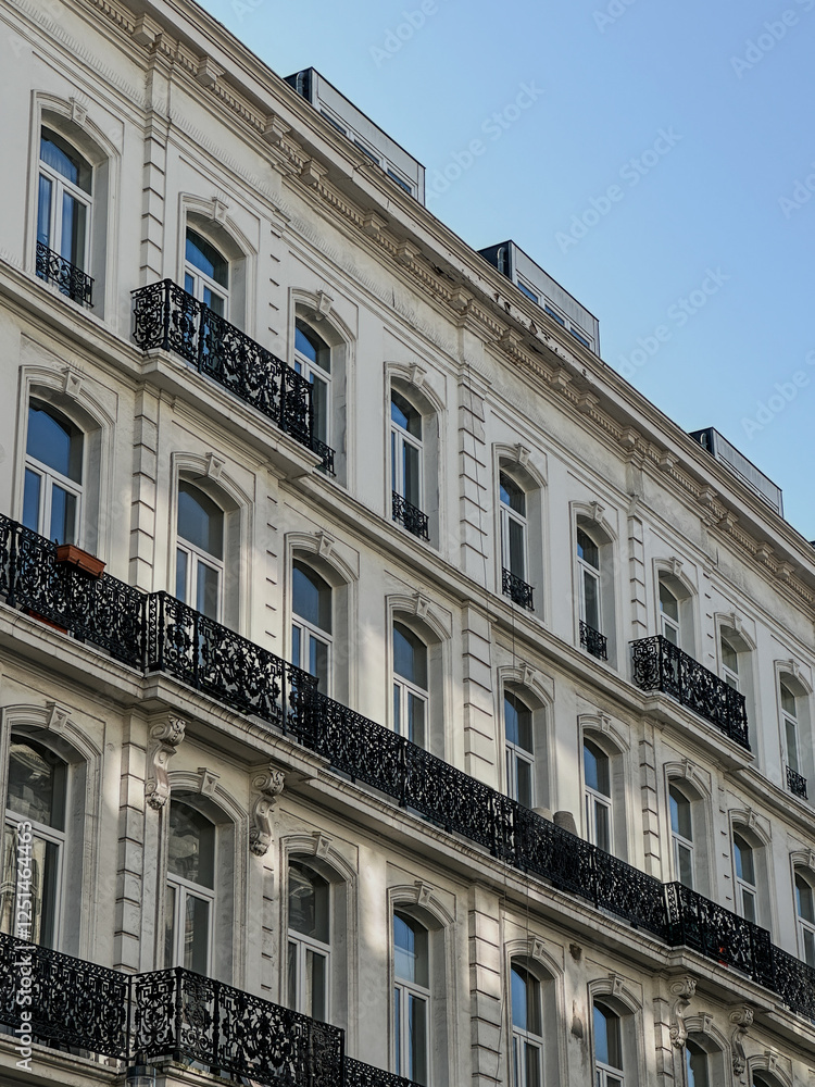 Fototapeta premium Historical residential house along Boulevard Adolphe Max in central Brussels, Belgium