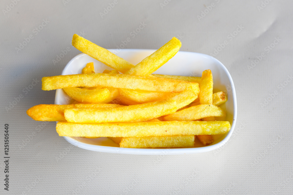 French fries Snack food crispy potato . Fast food or snacks concept. Patates cips. Patates kizartmasi. French fries Snack food crispy potato . Fast food or snacks concept. Patates cips. Patates kizartmasi.