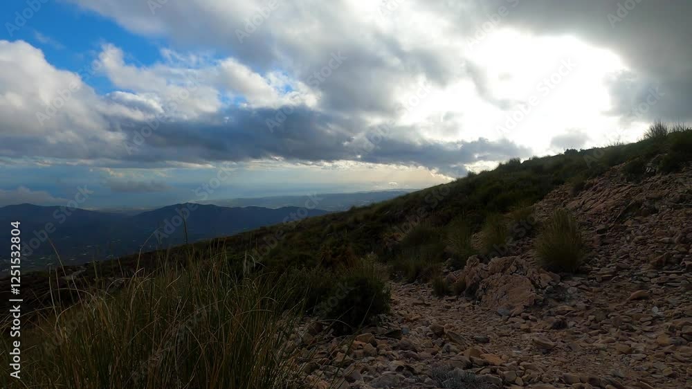 Fog and clouds on hiking trail to Maroma peak in thunderstorm day, Sierra Tejeda, Spain Fog and clouds on hiking trail to Maroma peak in thunderstorm day, Sierra Tejeda, Spain
