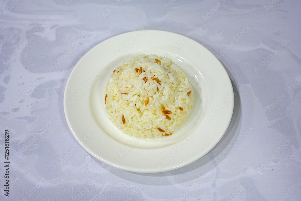 Traditional delicious Turkish food; Turkish style rice pilaf (Turkish name; Arpa sehriyeli. tavuk, kuru fasulyeli, pirinc pilavi). Cigerli, kavurmali, tereyagli nohut pilav.
Traditional delicious Turkish food; Turkish style rice pilaf (Turkish name; Arpa sehriyeli. tavuk, kuru fasulyeli, pirinc pilavi). Cigerli, kavurmali, tereyagli nohut pilav.