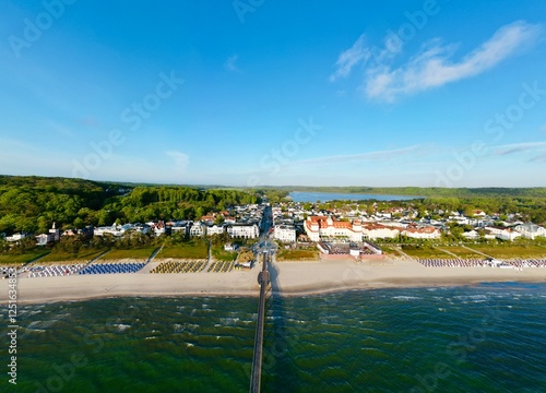Fototapeta Naklejka Na Ścianę i Meble -  Binz, Rügen, Germany, Baltic Sea, drone view, aerial photo, beach, city, sea blue cloudy sky