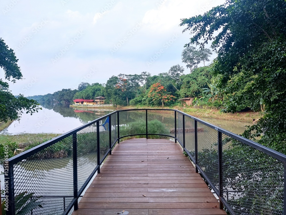 Naklejka premium wooden bridge over the river