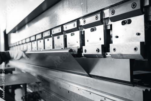Fotografie Industrial sheet metal bending machine in operation