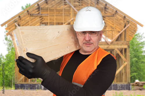 Man builder with boards on ...