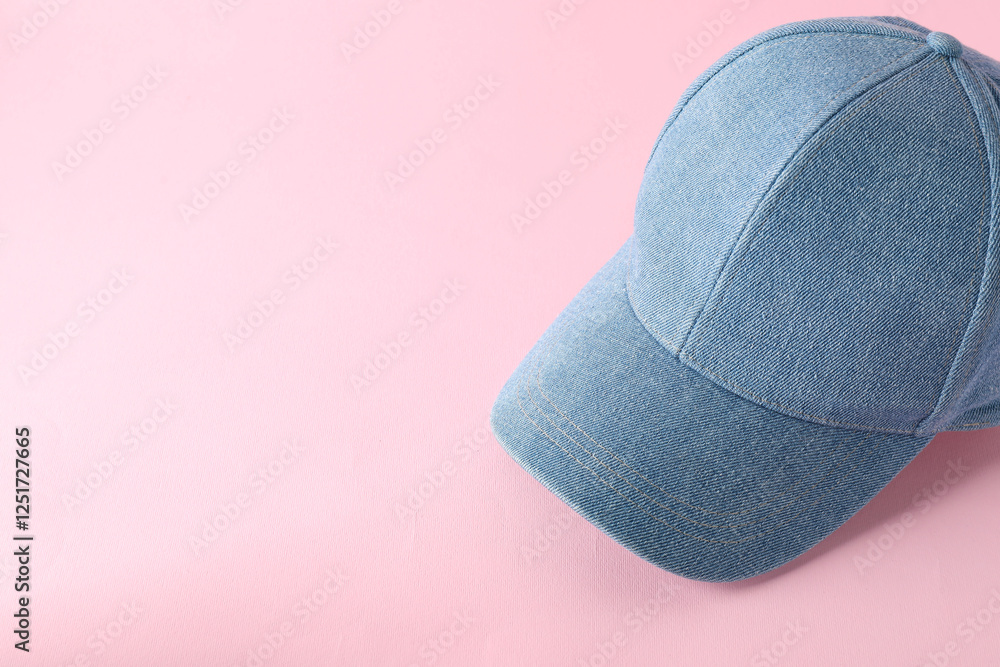 Stylish denim baseball cap on pink background. Mockup for design Stylish denim baseball cap on pink background. Mockup for design