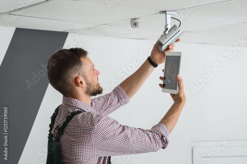 Male worker with tablet com...