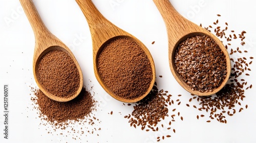 Three wooden spoons filled with different grinds of flaxseed on a white background.