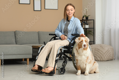 Young woman in wheelchair w...