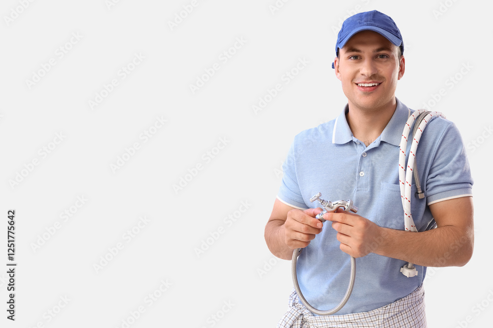 Male plumber with hoses on white background Male plumber with hoses on white background