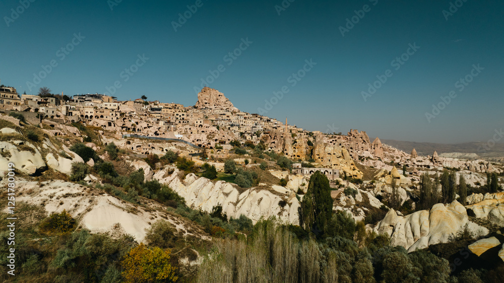 Fototapeta premium The Famous Uchhisar Cave Castle In Cappadocia, At Sunset, Turkey, Aerial View