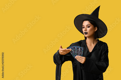 Beautiful young witch with ...