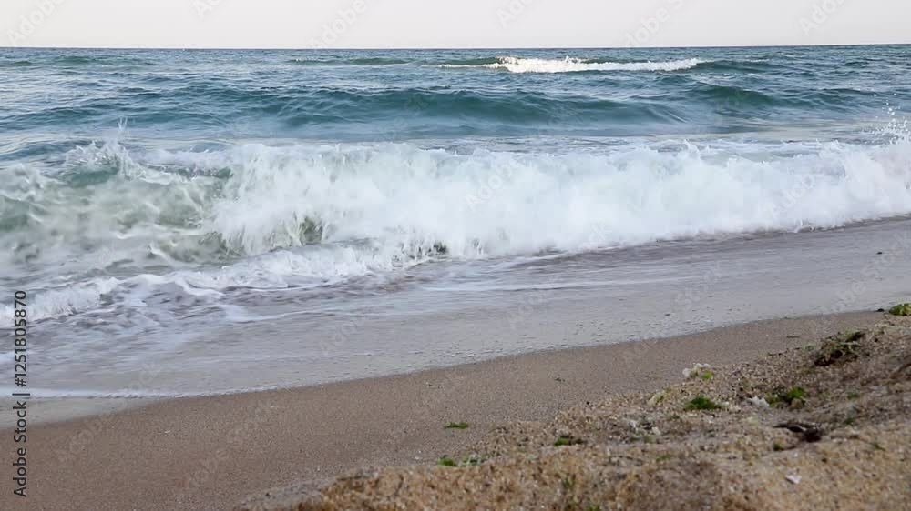 Beautiful Natural background on the surface of the moving sea waves. Close Beautiful Natural background on the surface of the moving sea waves. Close