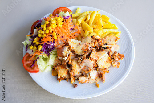 Lavash zurna doner kebab ( zurna  durum )  or shawarma sliced in plate isolated.  hatay usulu tavuk Et doner durum. Gobit ekmek arasi doner. Pilavustu iskender doner kebap.  photo