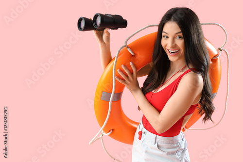 Female beach rescuer with l...