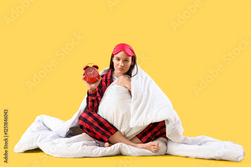 Sleepy young woman with bla...