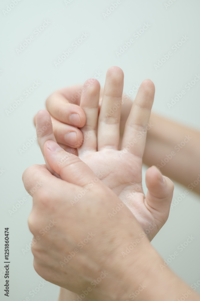 Close-up of female hands during massage. Vertical photo. Close-up of female hands during massage. Vertical photo.