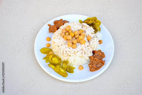 Traditional delicious Turkish food; Turkish style rice pilaf (Turkish name; Arpa sehriyeli. tavuk, kuru fasulyeli, pirinc pilavi). Cigerli, kavurmali, tereyagli nohut pilav.
 photo