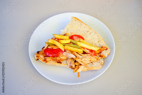 Lavash zurna doner kebab ( zurna  durum )  or shawarma sliced in plate isolated.  hatay usulu tavuk Et doner durum. Gobit ekmek arasi doner. Pilavustu iskender doner kebap.  photo