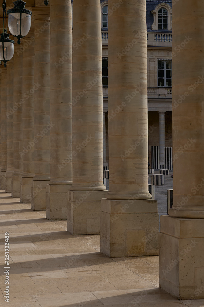 A quiet corridor where every step echoes through history. Palais-Royal, Paris, France A quiet corridor where every step echoes through history. Palais-Royal, Paris, France