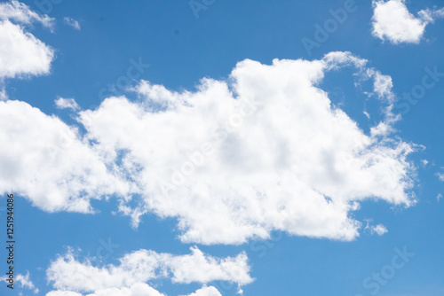 White clouds in a blue sky