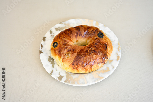 Turkish pastry product , tasty pogaca, acma . Simit, gevrek. Turkish Pastries; peynirli, patatesli, kasarli pogaca, sosili acma, dereotlu pogaca,  borek, acma, ay coregi at patisserie showcase. photo