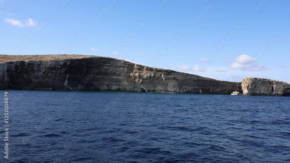 Elephant rock and Santa Maria caves cliffs on Comino island, Malta Elephant rock and Santa Maria caves cliffs on Comino island, Malta