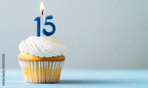 Birthday cupcake with fifteen candles photo