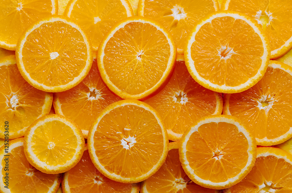 Fototapeta premium Juicy oranges, top photo, flatlay, orange background