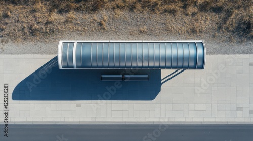 A clean top-down view of a minimalist bus stop with a metal bench and a curved shelter, surrounded by an empty concrete sidewalk.