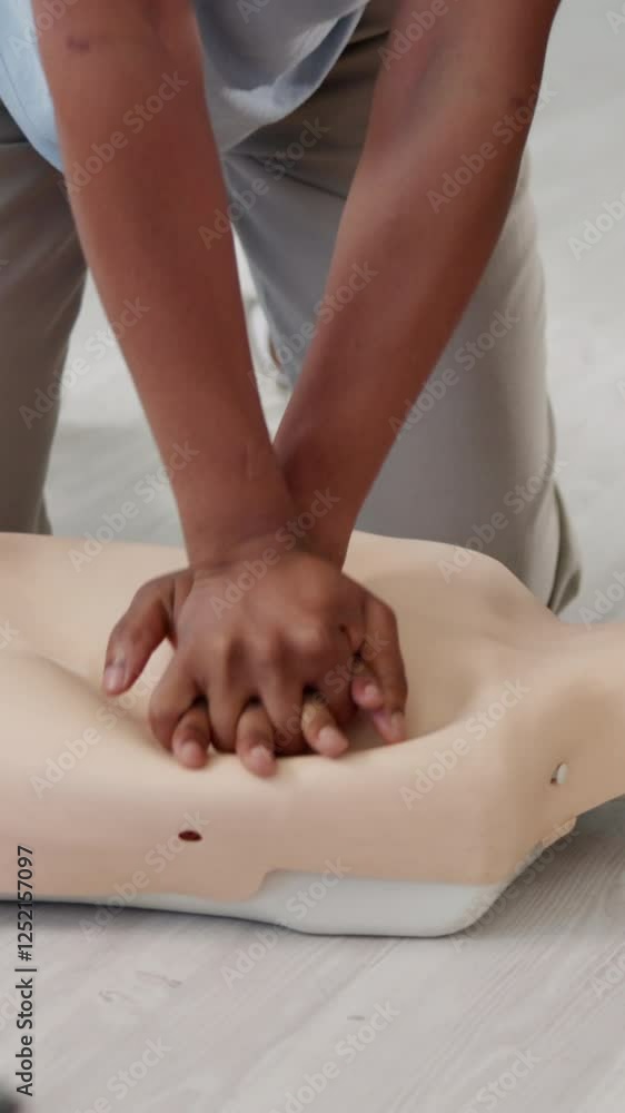 Hands, first aid and instructor with mannequin for CPR training, health and safety workshop. Closeup, teacher or paramedic with demonstration for blood circulation or emergency rescue at workplace Hands, first aid and instructor with mannequin for CPR training, health and safety workshop. Closeup, teacher or paramedic with demonstration for blood circulation or emergency rescue at workplace