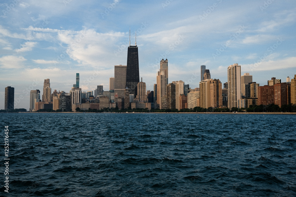 Chicago skyline with John Hancock Center, view from Lake Michigan, modern skyscrapers, waterfront cityscape, deep blue water, urban architecture, famous landmark, iconic downtown skyline Chicago skyline with John Hancock Center, view from Lake Michigan, modern skyscrapers, waterfront cityscape, deep blue water, urban architecture, famous landmark, iconic downtown skyline
